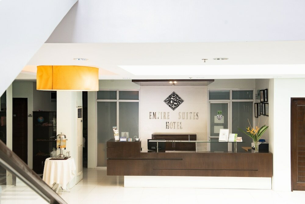 Фото Empire Suites Hotel