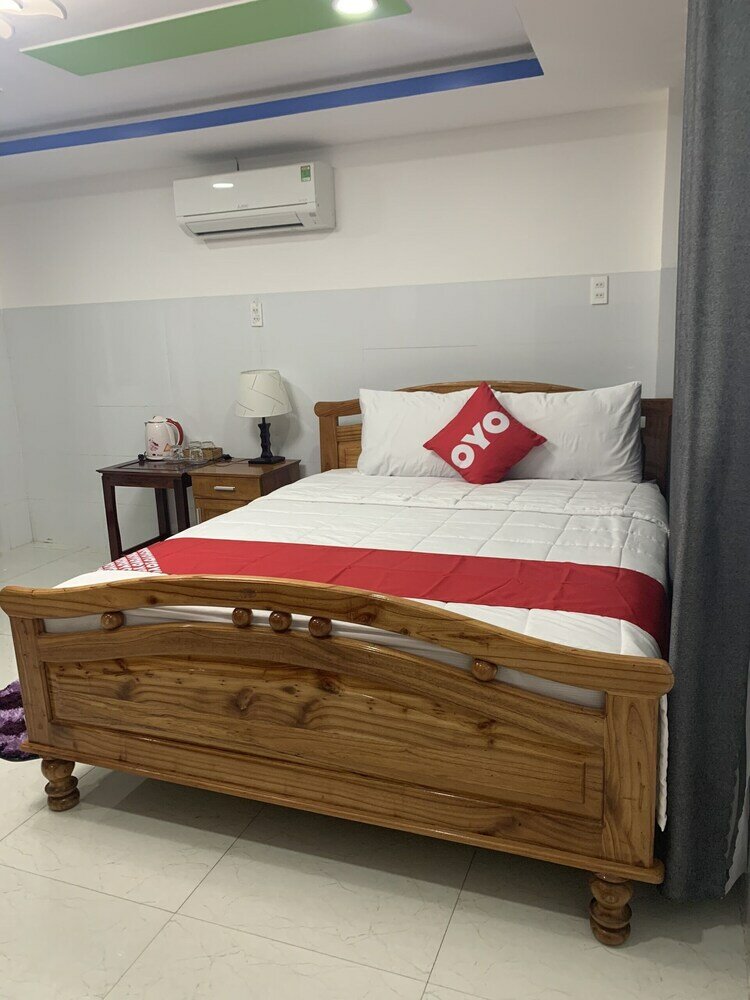 Фото Oyo 1028 Flower House Apartment