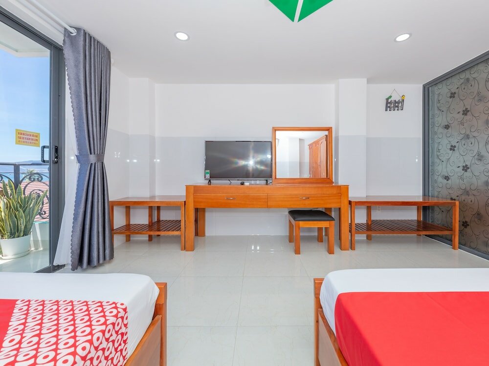 Фото Oyo 1028 Flower House Apartment