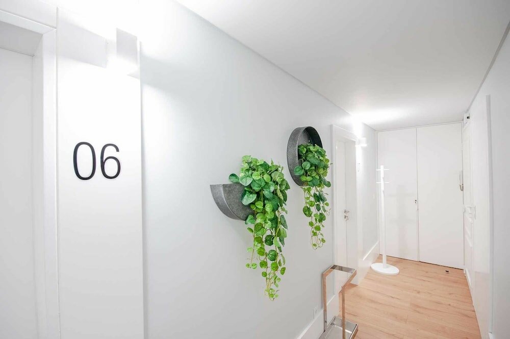 Фото Nlc Rooms & Suites