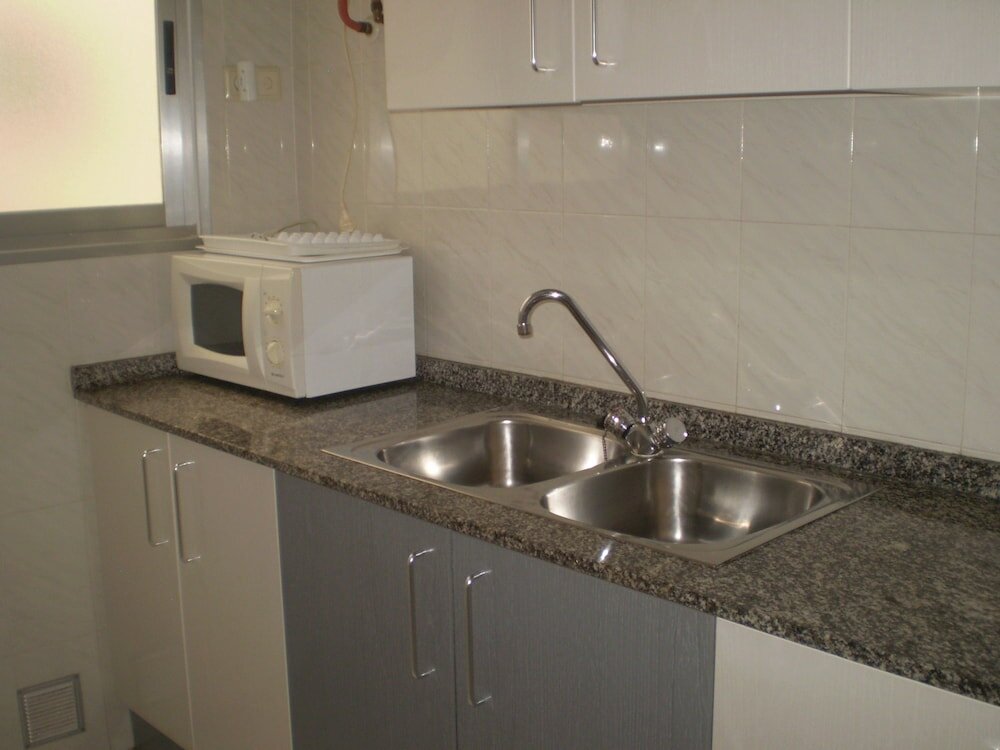 Фото Apartamentos El Oasis