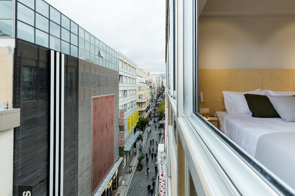 Фото Rastoni Athens Suites nearAcropolis at Tsatsou Street