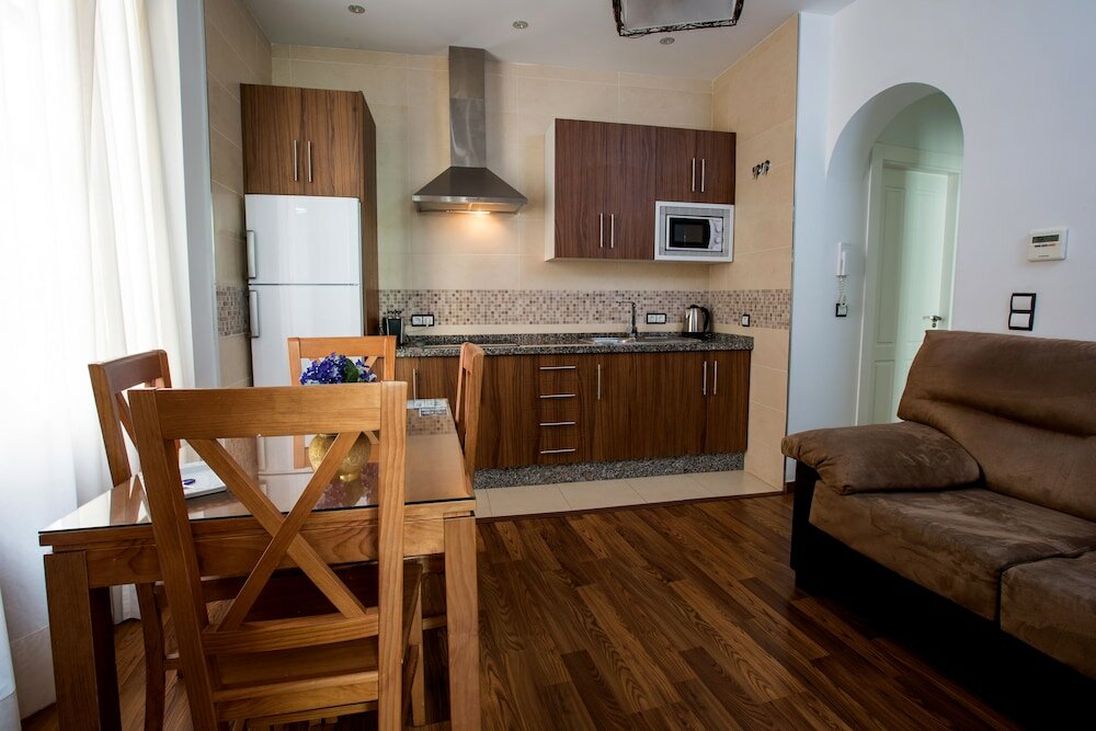 Фото Apartamentos Lonja del Marques