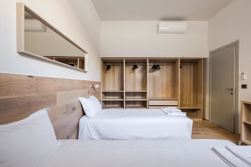 Фото Sant'orsola Suites Apartments