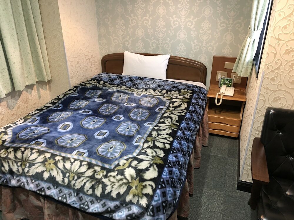 Фото Nishikawaguchi Station Hotel Stay Lounge