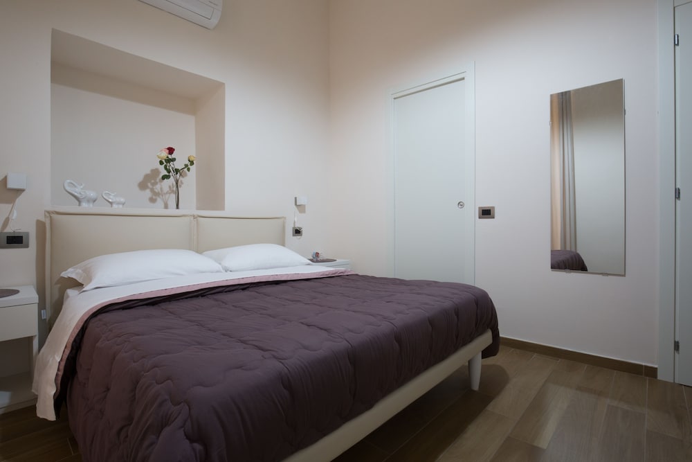 Фото Musto Suites & Rooms