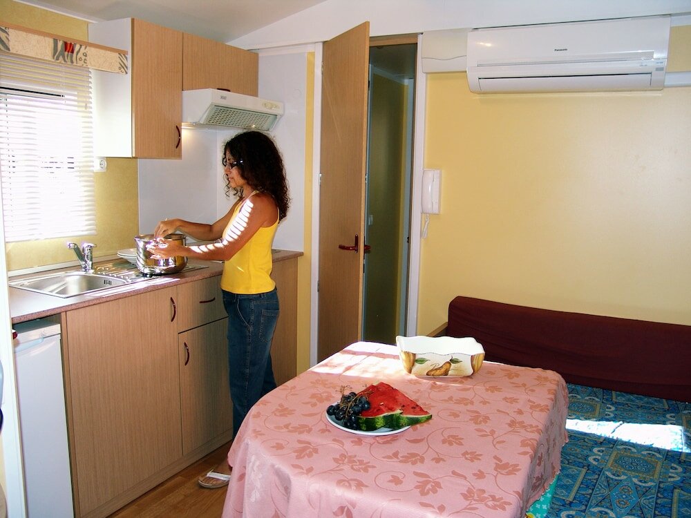 Фото Happy Camp in Camping Villaggio Thurium