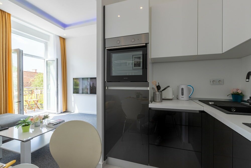 Фото Tesla Boutique Apartments & Rooms