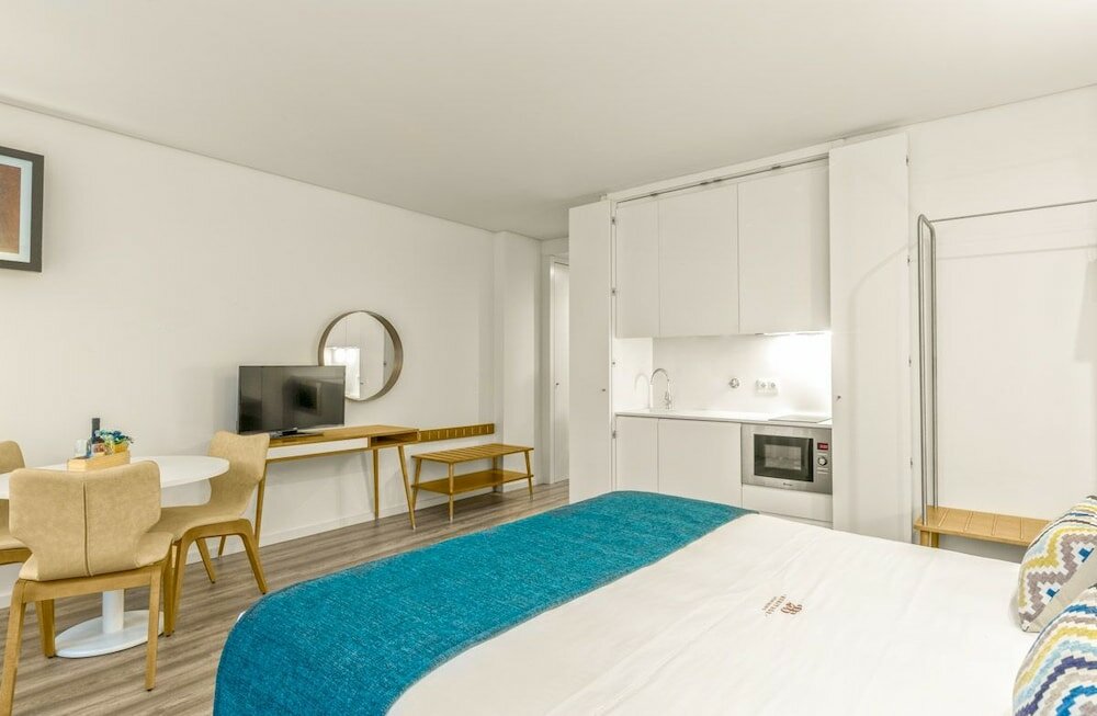 Фото 296 Heritage Apartments