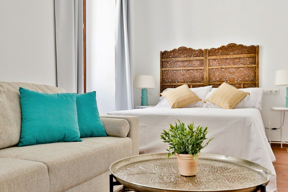 Фото Apartamentos Puerta Sevilla De Cordoba