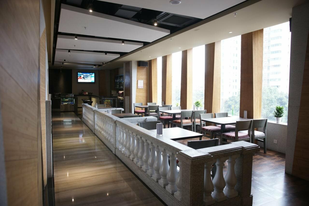 Фото Guangzhou Timmy Hotel