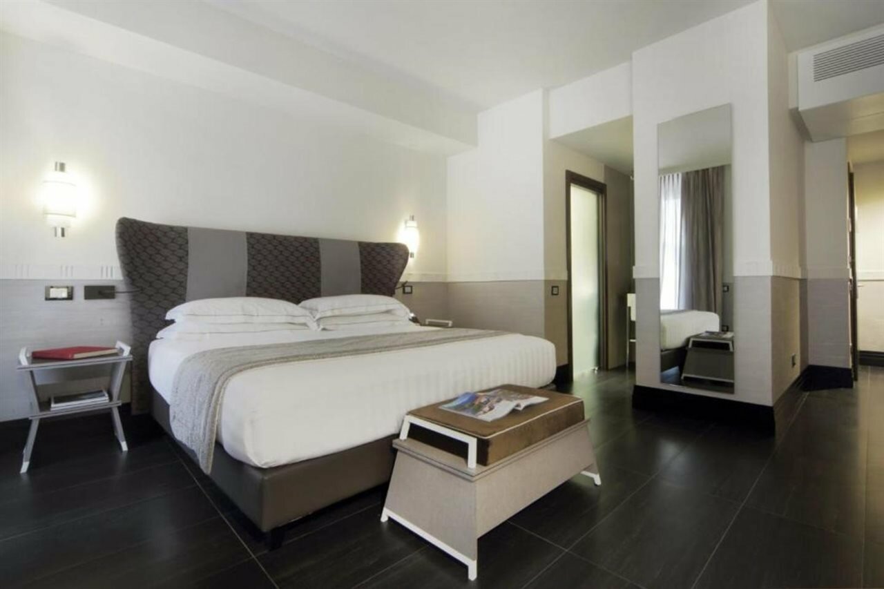 Фото Unica Suites Rome