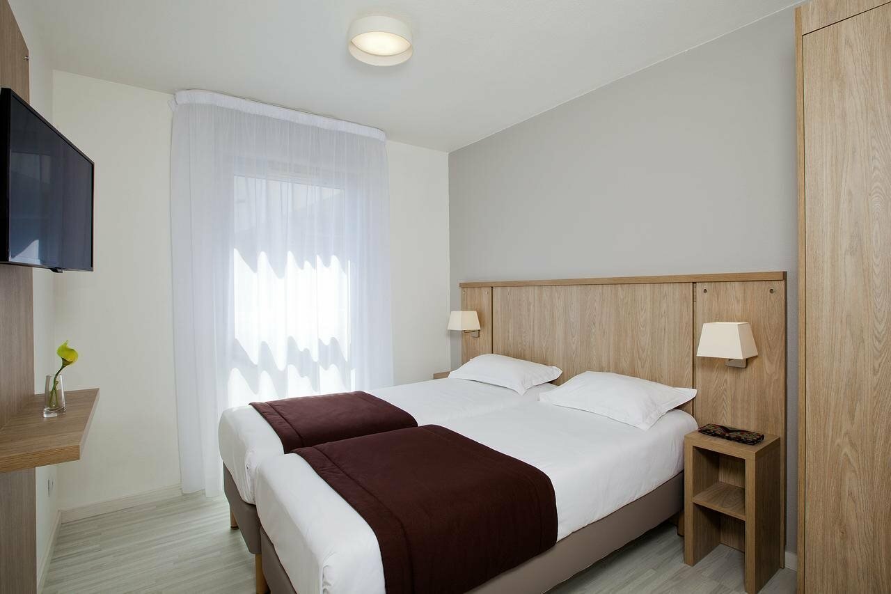 Фото Residhome Appart Hotel Lyon Gerland