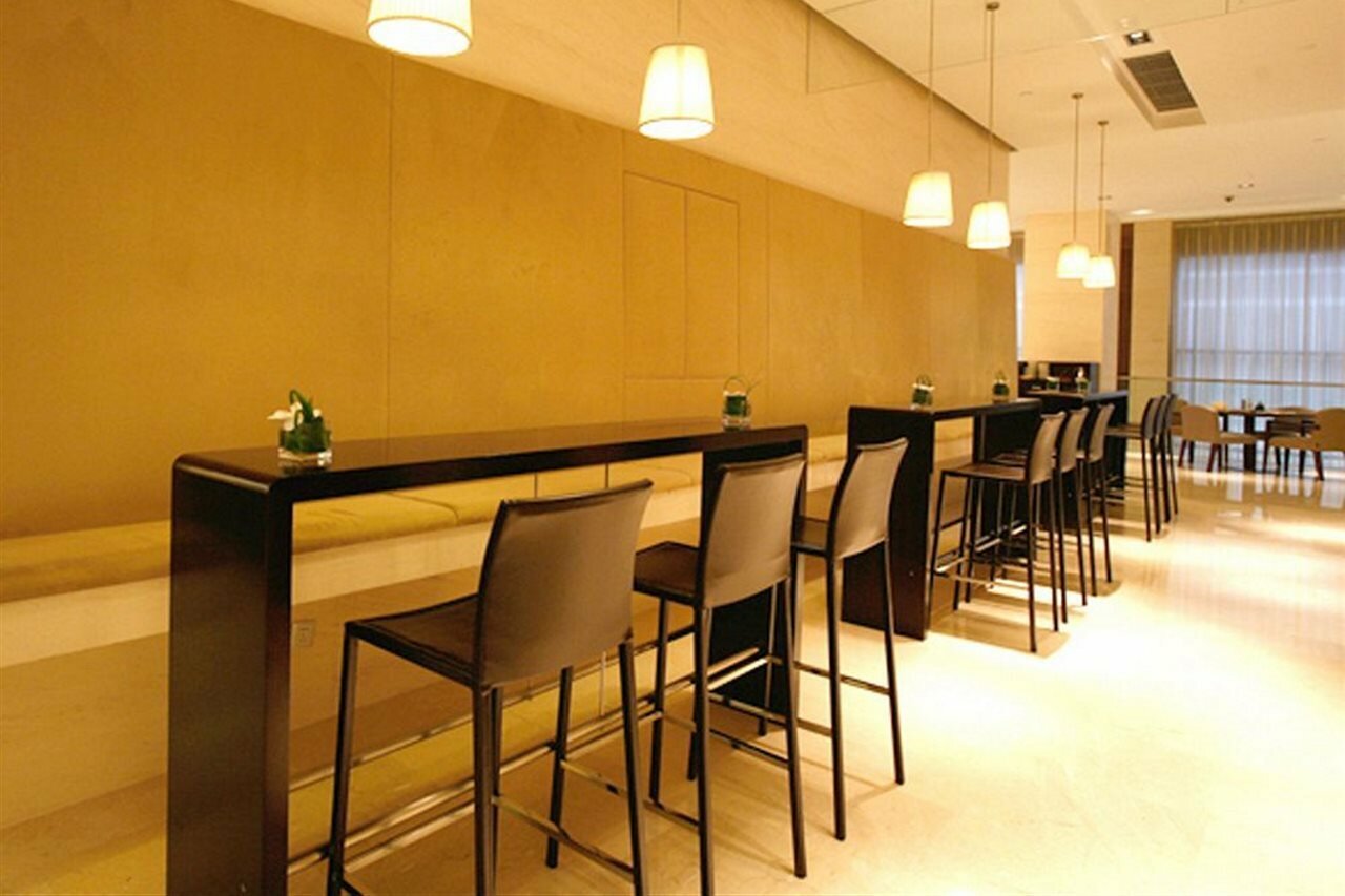 Фото Howard Johnson Parkland Hotel Dalian