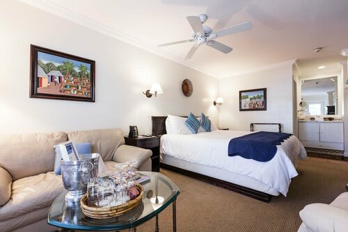 Гостиница The Caribbean Court Boutique Hotel