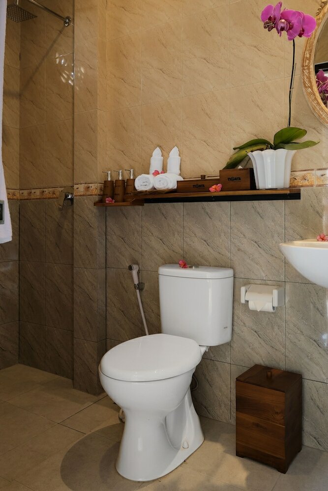 Фото Tigata Ubud Cottage