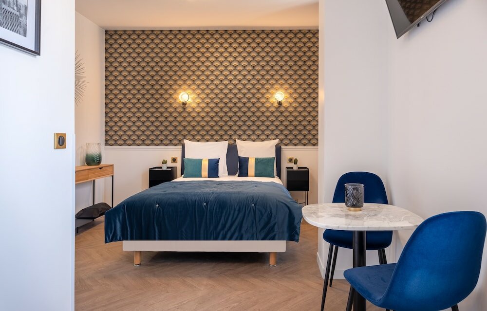 Фото Mijo's Appartements Hôtel