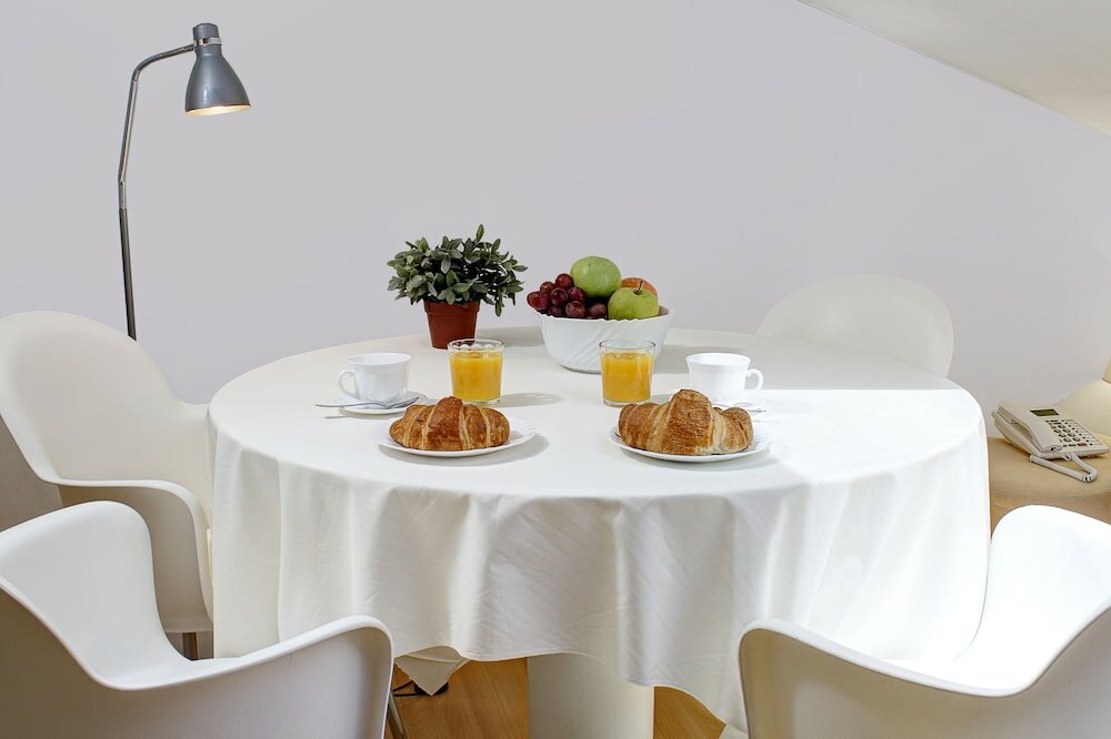 Фото Apartamentos Turísticos Centro