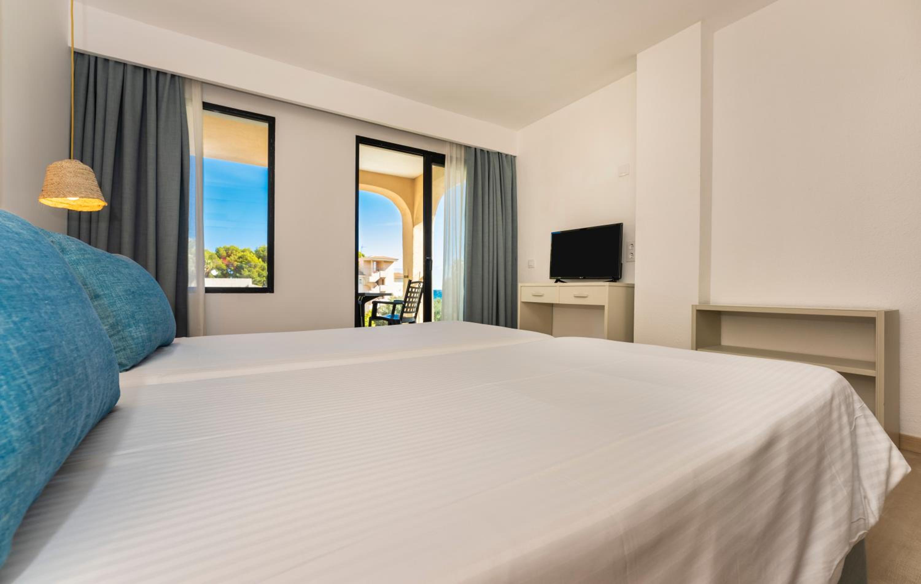 Фото Apartamentos Sinfony