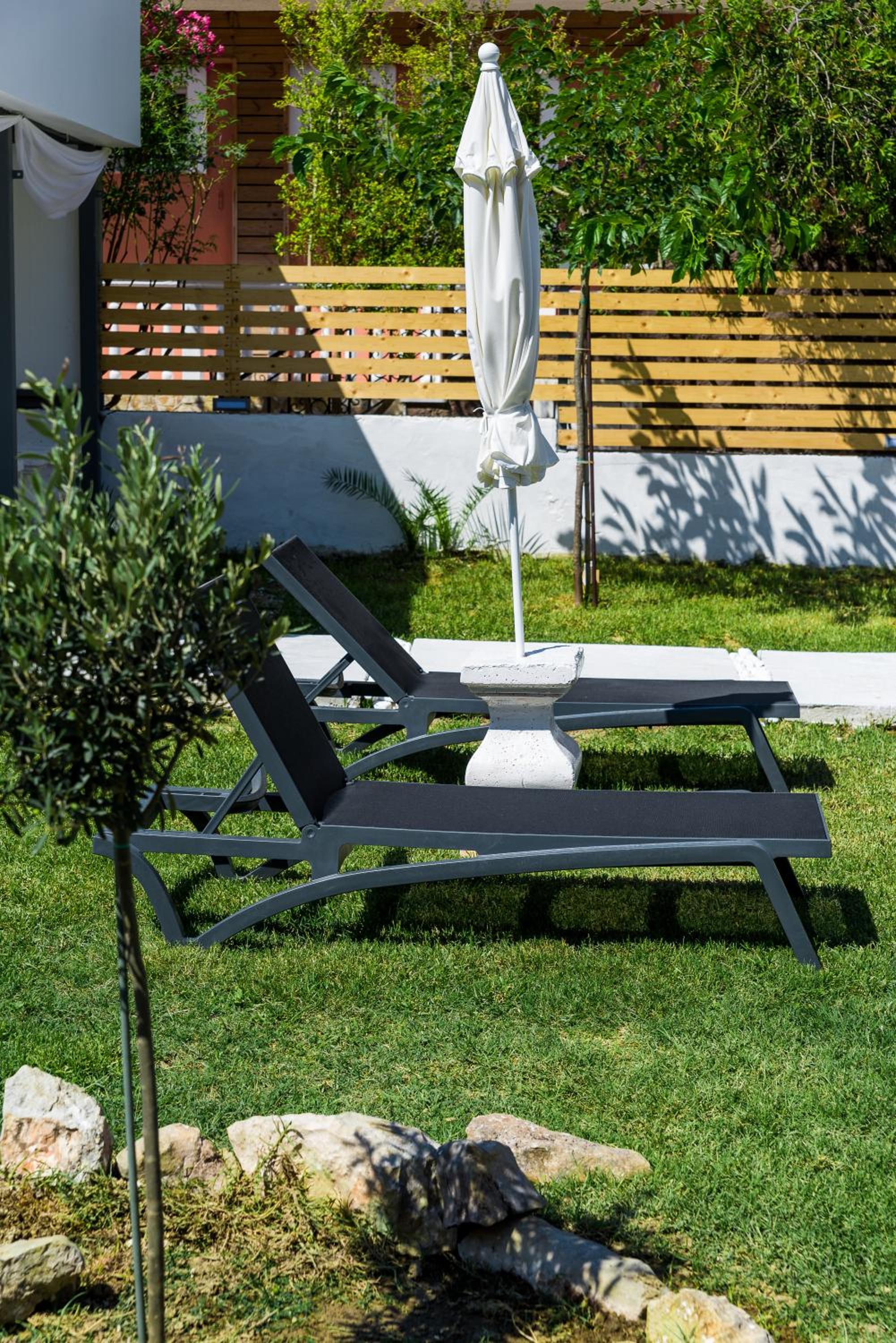 Фото Rooms 48 by Zante Plaza