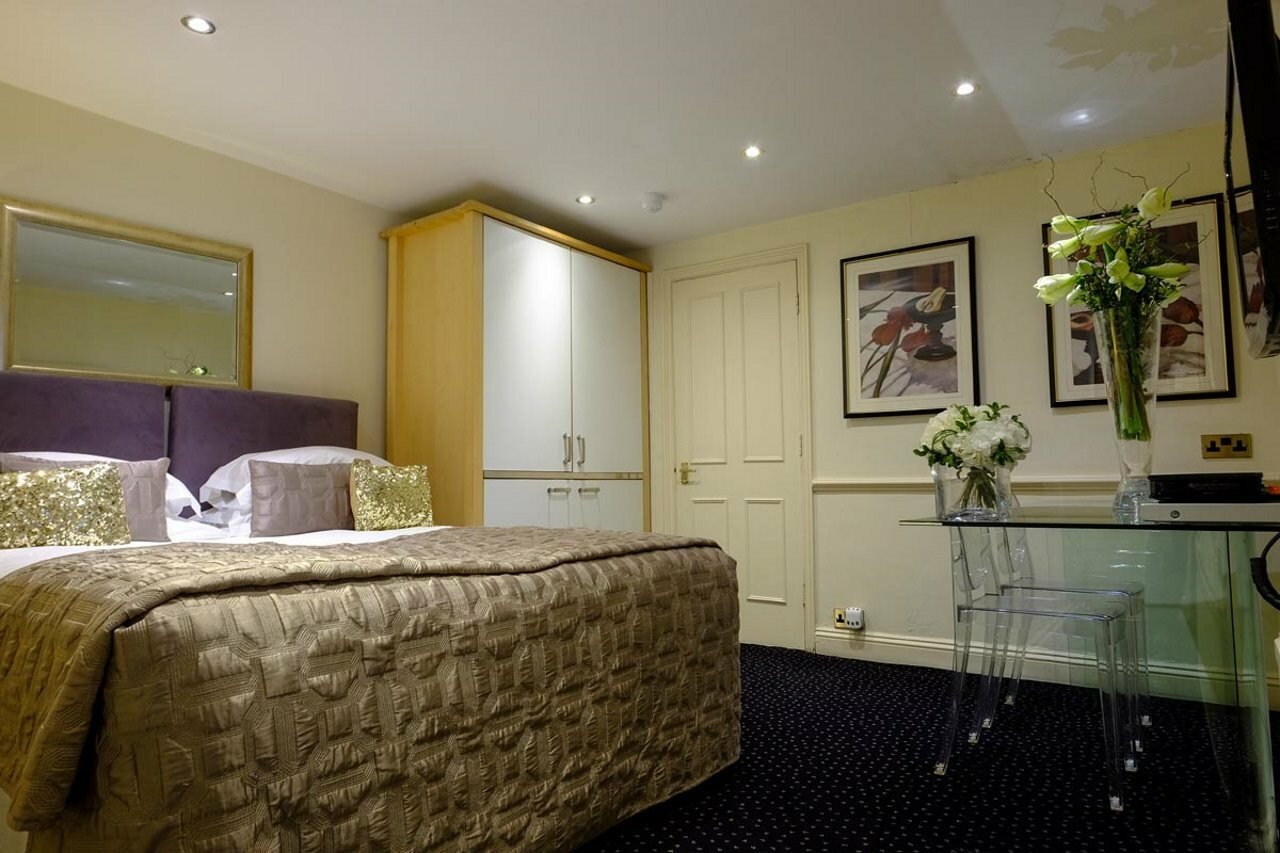 Фото Collingham Serviced Apartments