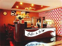 Фото Dynasty Inn Hotel