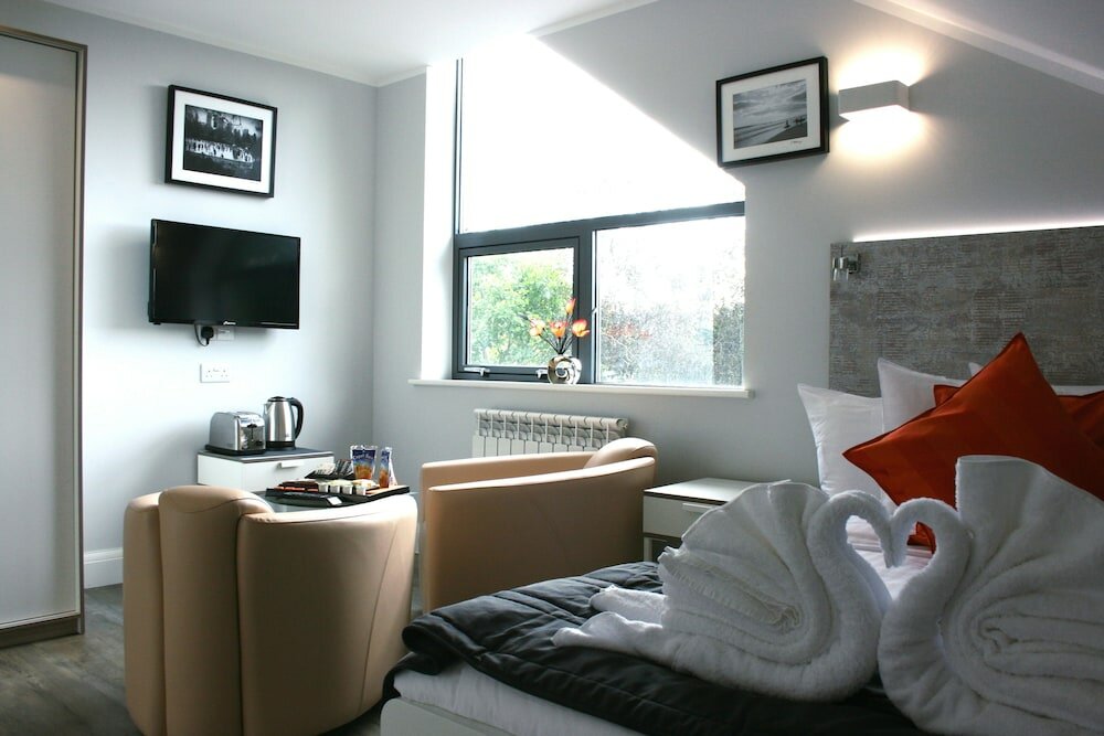 Фото Westciti Caroco Aparthotel