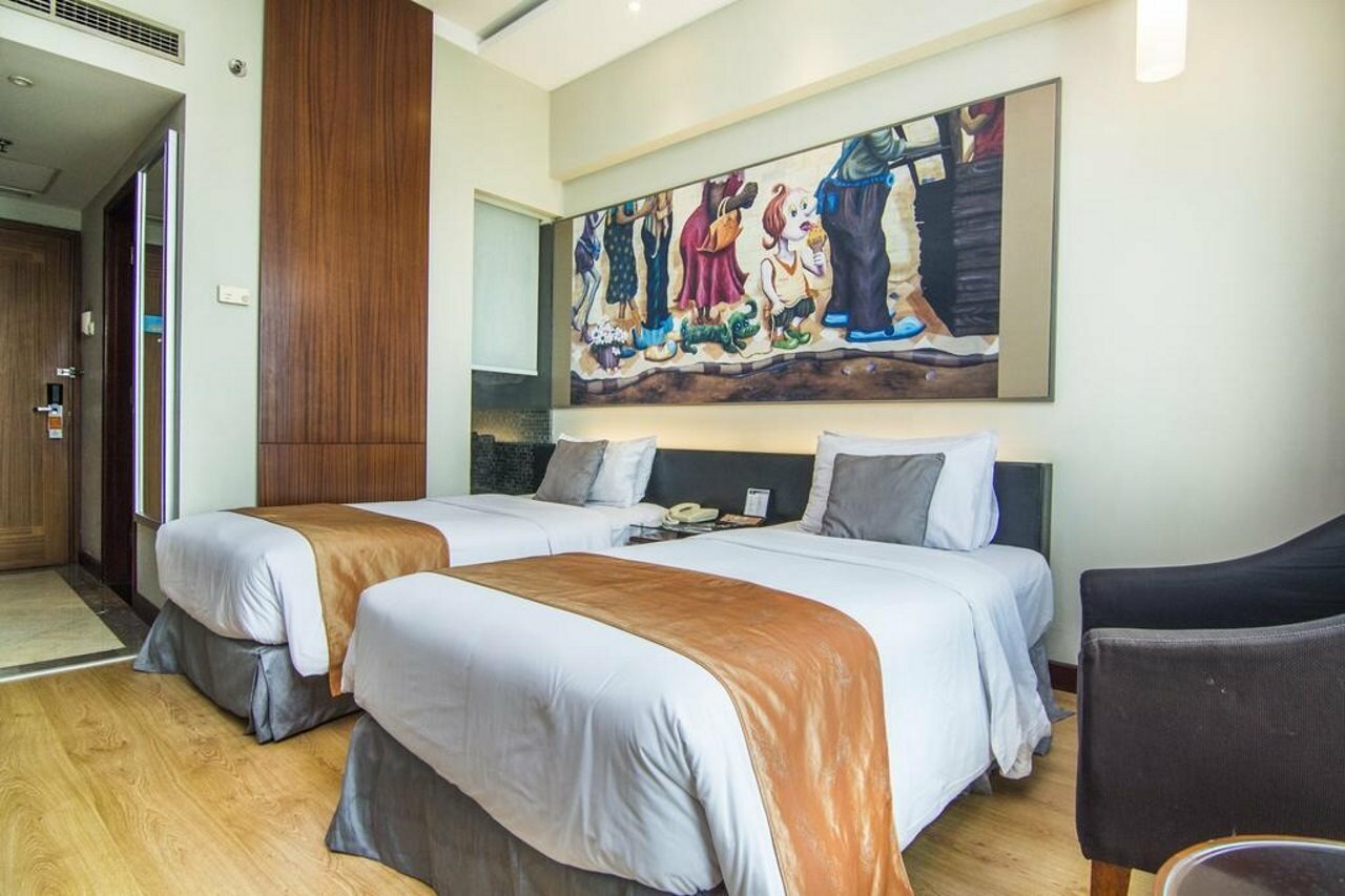 Фото Grand Candi Hotel