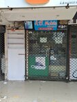 A. B Mobile (Allama Iqbal Town, Karim Block, 47), items for mobile phones