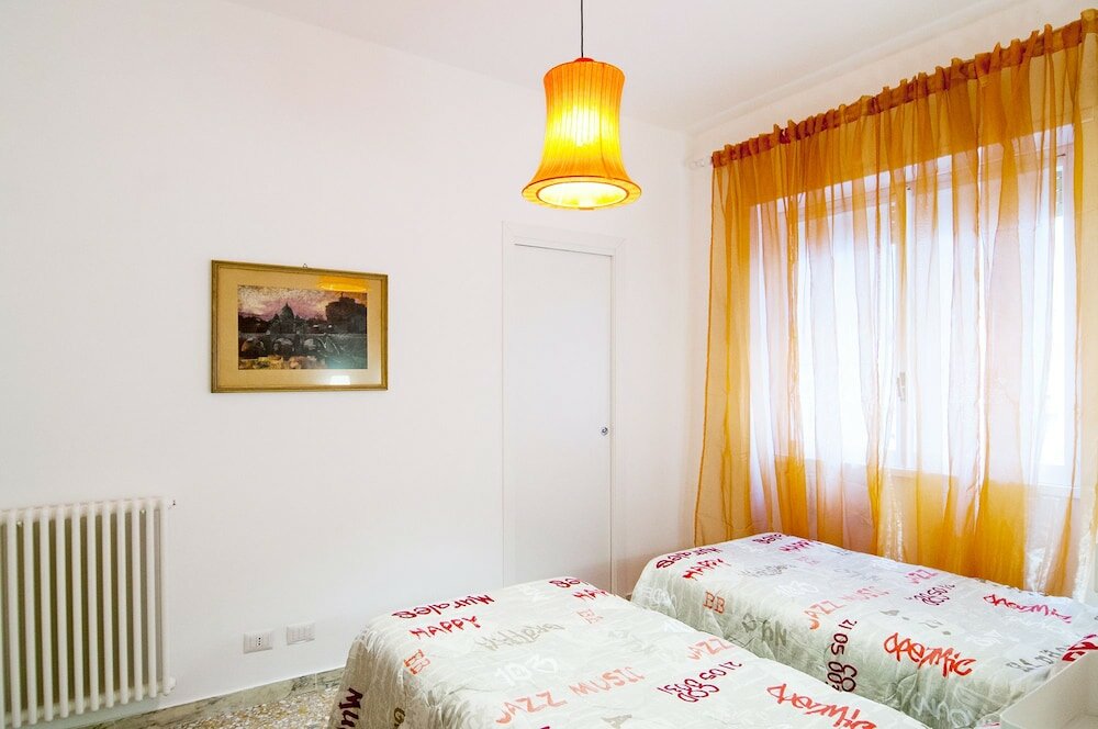 Фото San Pietro Bright Apartment