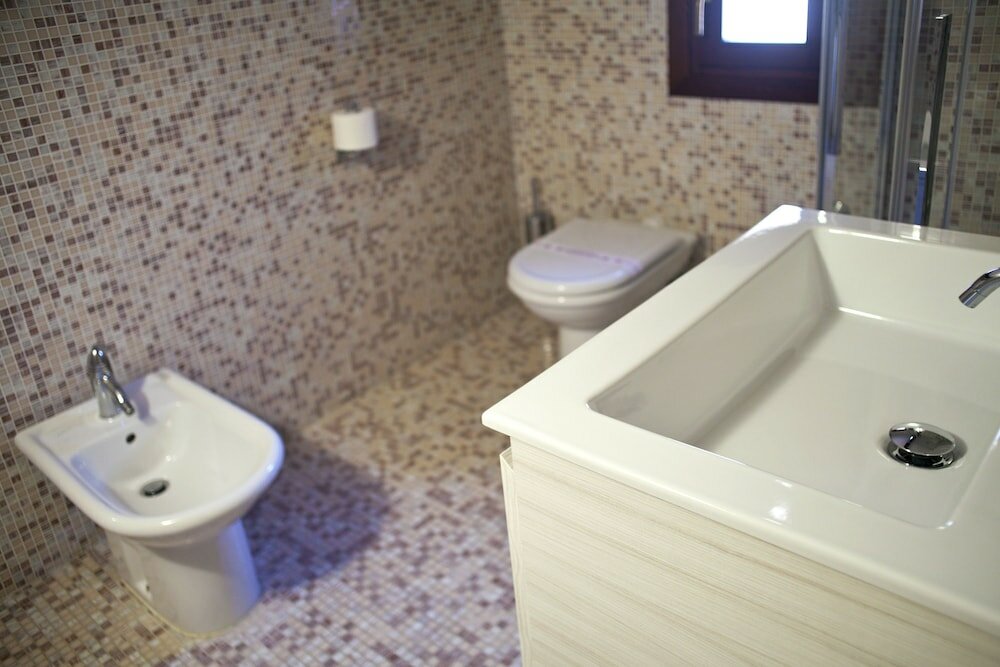 Фото Alle Guglie Boutique Hotel