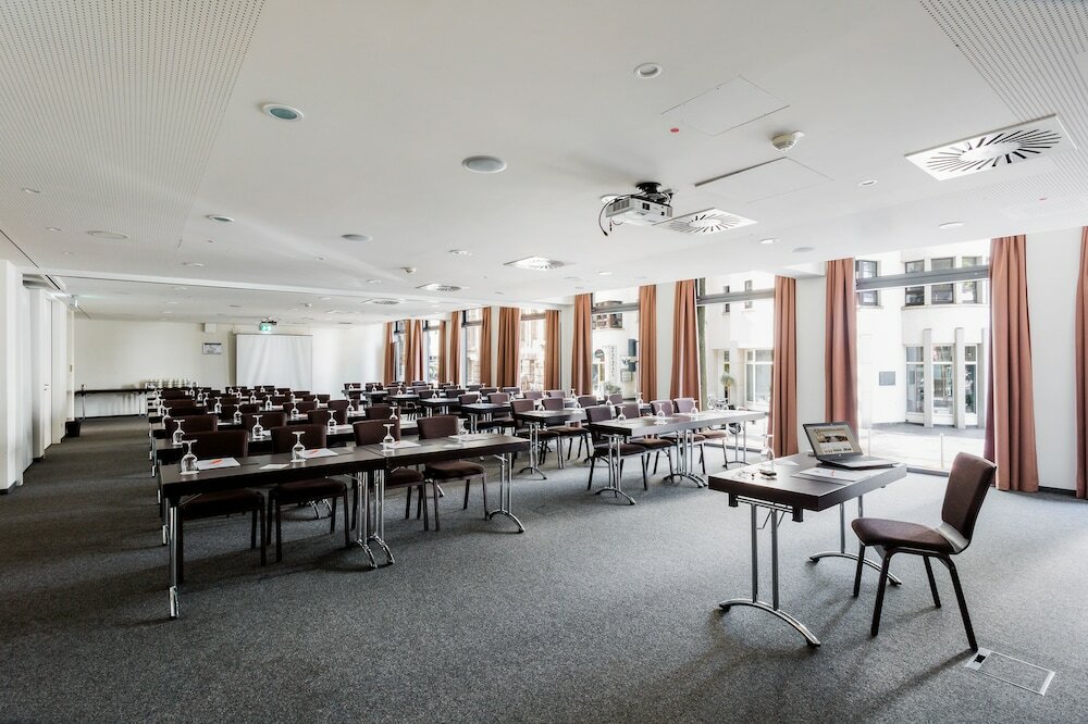 Фото Stadthotel am Römerturm