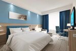 Hampton by Hilton Astana Triumphal Arch (Máńgilik El dańǵyly, 43A) ، فندق
