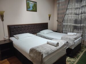 Grand Mumtoz (Tashkent, Karvonsaroy 6th Drive, 8), hotel