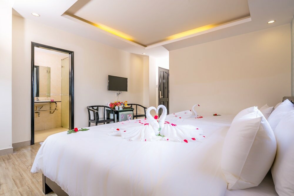 Фото La Maison Da Nang Beach