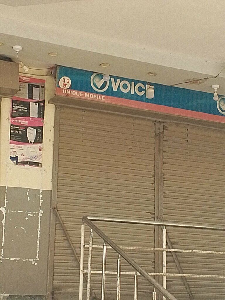 Items for mobile phones Unique mobile shop, Karachi, photo