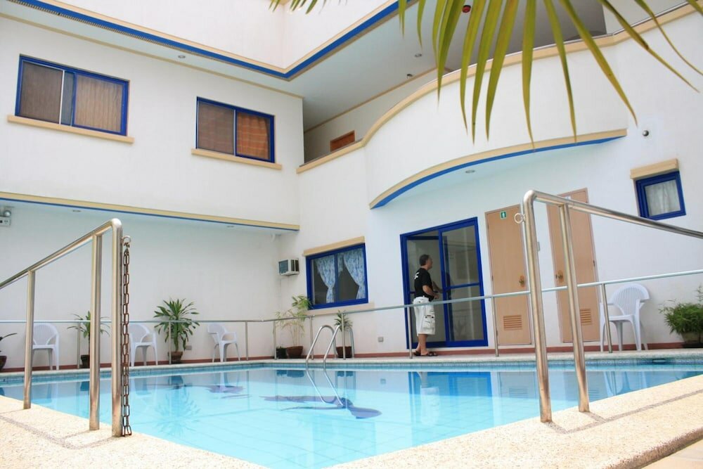 Фото Dumaguete Springs Apartment