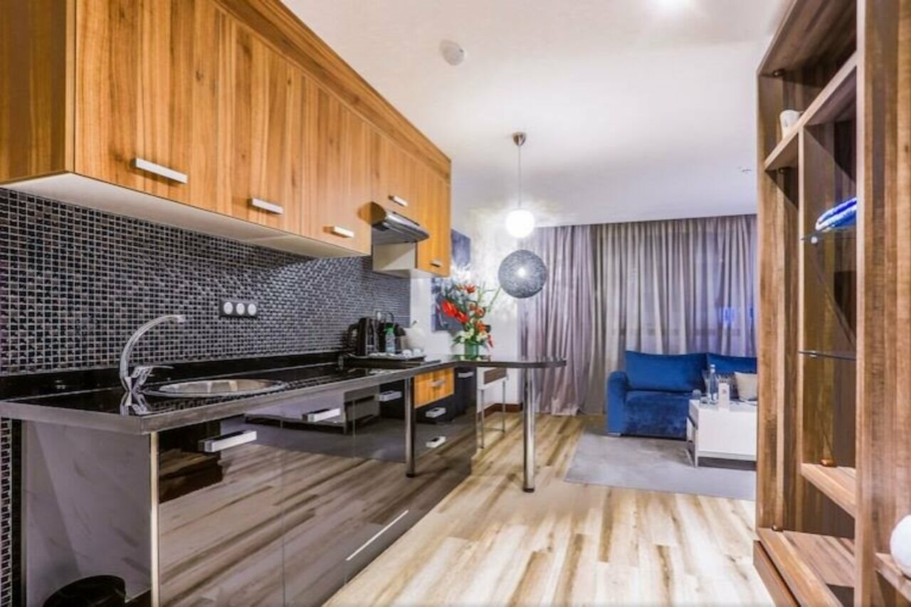 Фото Sbn Suites Hotel