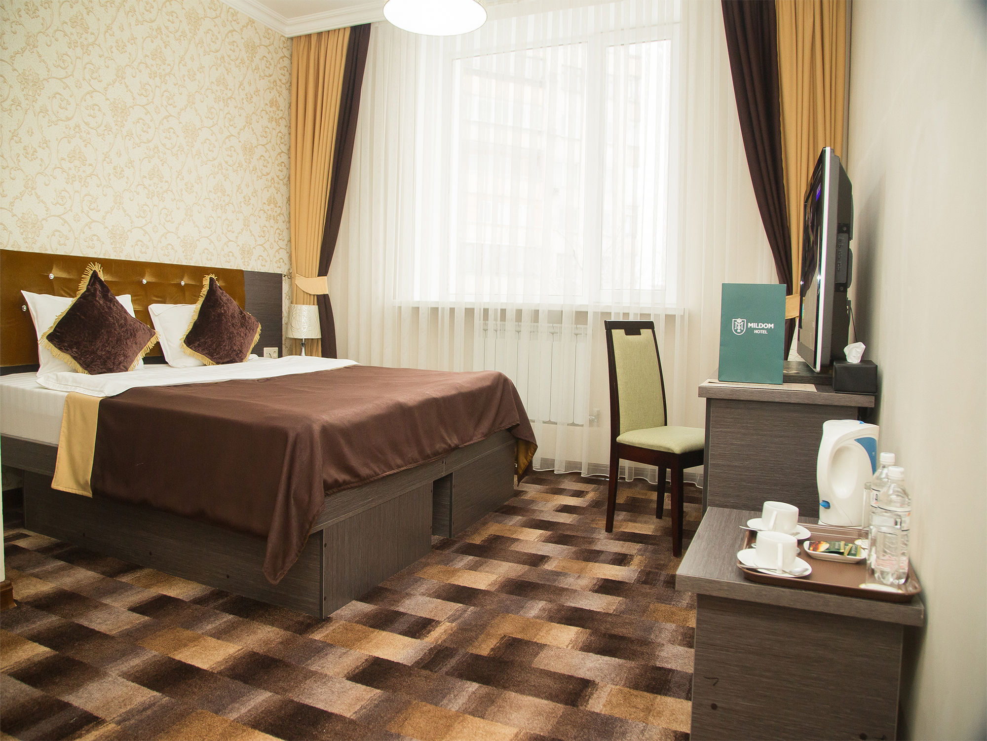 Фото Mildom Hotel