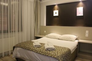 Гостиница The Corner Inn Hotels by Suit