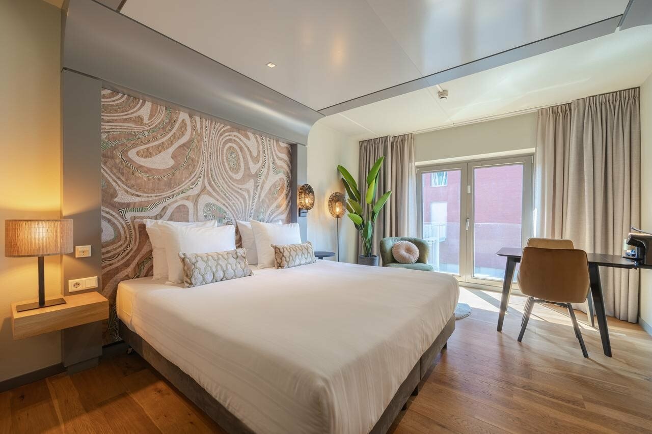 Фото Leonardo Hotel Breda City Center