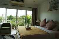 Фото Corner Cafe Bed and Breakfast