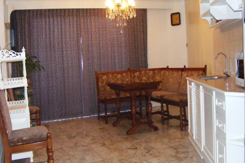 Фото Garden Paradise Hotel & Serviced Apartment