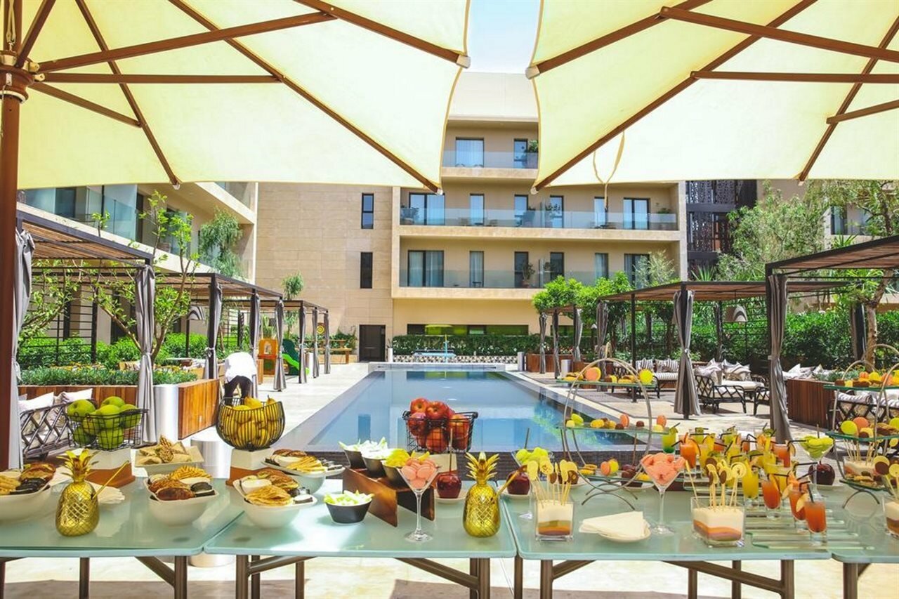 Фото Radisson Blu Hotel, Marrakech Carre Eden