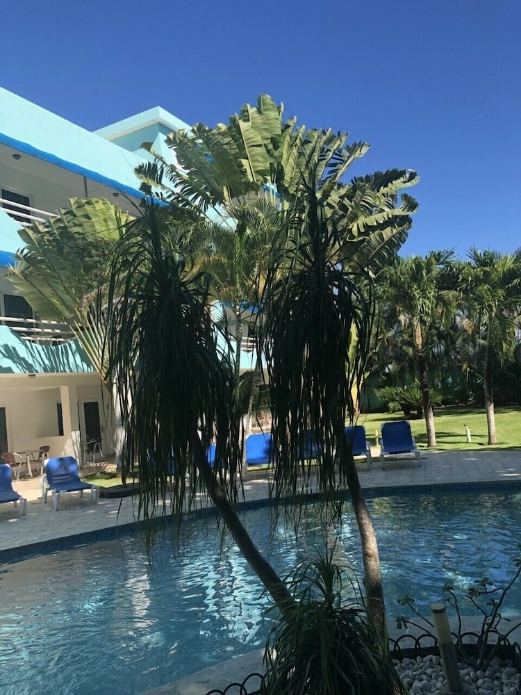 Фото New Garden Hotel