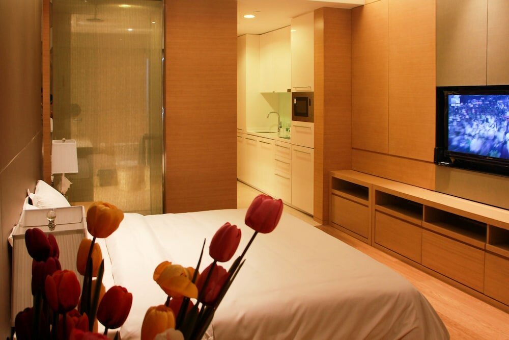 Фото Xingyi International Hotel Poly Store