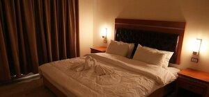 Гостиница Jewheret Alswefiah hotel suites
