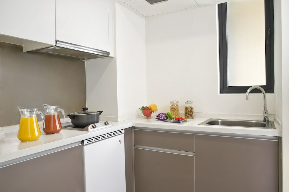 Фото Citadines Xinghai Suzhou