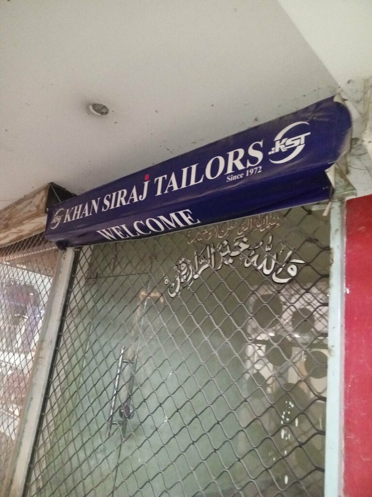 Repair of clothes Khan siraj tarlar shop, Lahore, photo