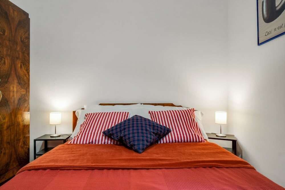 Фото A due passi dalla Pinacoteca Apartment